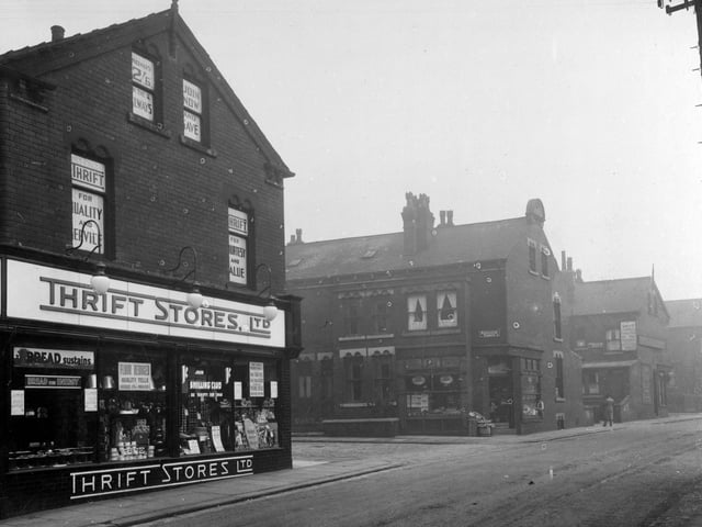 Foundry Lane in September 1935.To the left is no 3 Foundry Lane - Thrift Stores Ltd. A large new sign has been put up above the shopfront selling bread, flour and butter. An imprint on the window advises customers to join the 'Shilling Club'. To the right is Broughton Terrace and the premises of Benjamin Rymer - fruit shop.