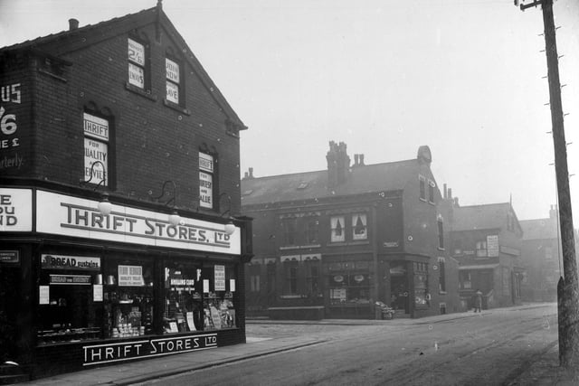 Foundry Lane in September 1935.To the left is no 3 Foundry Lane - Thrift Stores Ltd. A large new sign has been put up above the shopfront selling bread, flour and butter. An imprint on the window advises customers to join the 'Shilling Club'. To the right is Broughton Terrace and the premises of Benjamin Rymer - fruit shop.