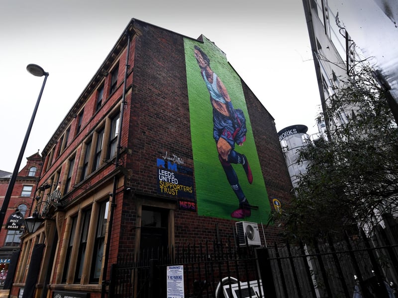 Created by Adam Duffield, the mural celebrates the special moment when Pablo Hernandez' goal secured Leeds United's promotion back to the Premier League after years. The 50ft mural is painted across the side of Duck and Drake pub on Kirkgate, Leeds city centre.
