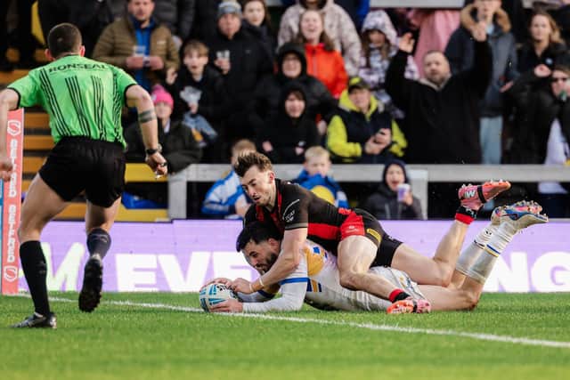 Jack Bird scores his first Leeds Rhinos try, during his home debut, in the 26-22 win against Warrington Wolves. Picture by Alex Whitehead/SWpix.com.