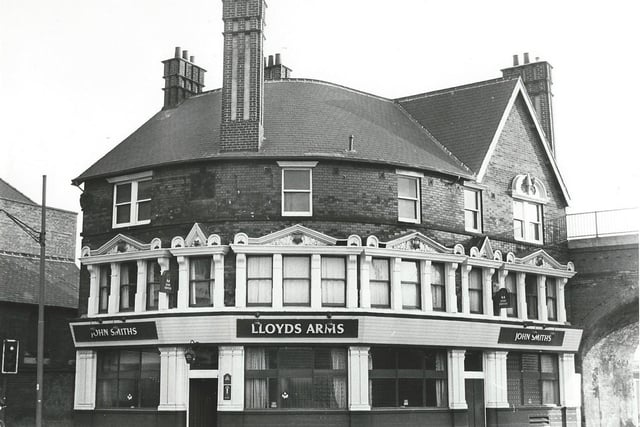 The Lloyds Arms, a John Smiths' public house, on Duke Street, by the corner with York Street, left. The railway bridge crossing Duke Street is on the right. The pub was demolished in 1994 to make way for the building of the inner city loop road; it had been there since at least 1817 when W. Pike was the landlord.