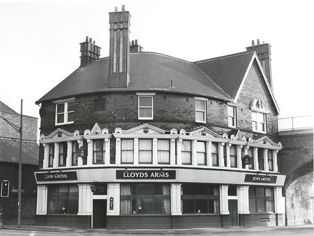 The Lloyds Arms, a John Smiths' public house, on Duke Street, by the corner with York Street, left. The railway bridge crossing Duke Street is on the right. The pub was demolished in 1994 to make way for the building of the inner city loop road; it had been there since at least 1817 when W. Pike was the landlord.