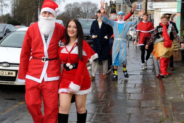 Many revellers have dressed up as Santa Claus.
