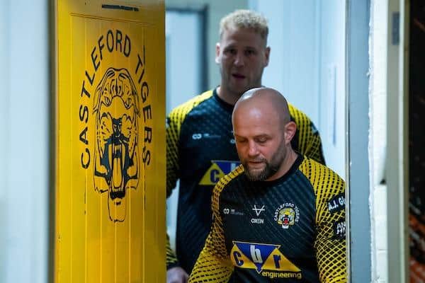 Paul McShane leads Castleford Tigers out for their warm-up ahead of this season's Easter home derby with Leeds Rhinos. Picture by Allan McKenzie/SWpix.com.