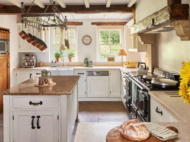 Eliza can enjoy preparing meals for family and friends in the beautiful kitchen and dining space, complete with Aga cooker - which leads into a spacious garden room that allows an abundance of natural light to pour in during the day and has a contemporary wood burning stove to snuggle up in front of on long winter nights.