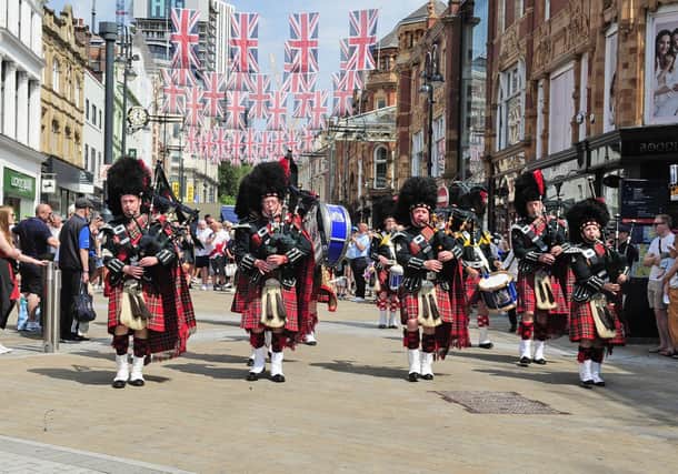 The City of Leeds Pipe Band helping to lead the procession through Leeds.