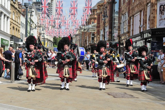 The City of Leeds Pipe Band helping to lead the procession through Leeds.