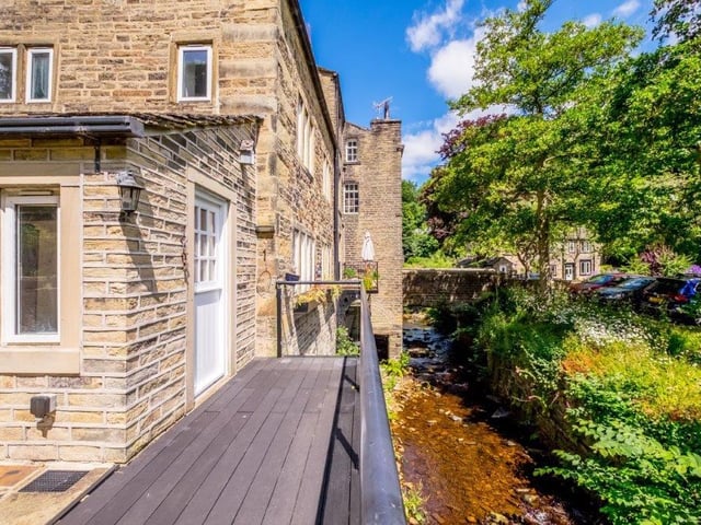 This balcony overlooks the stream that traverses the grounds.