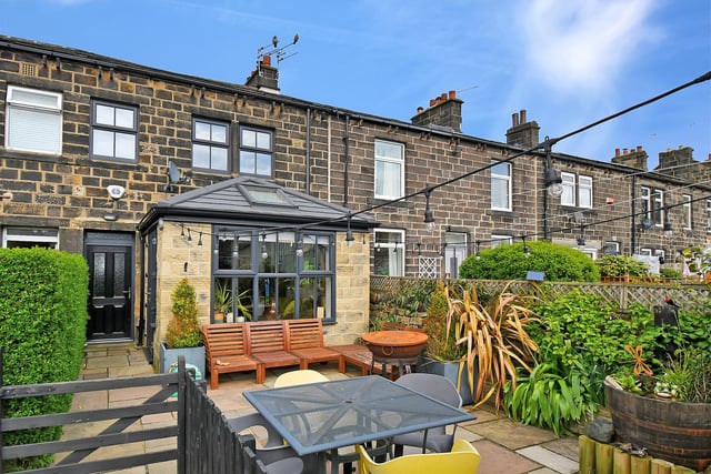 Nestled in the heart of the picturesque town of Yeadon, this enchanting three bedroom stone cottage is the epitome of charm and character.