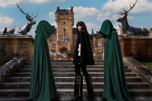 The Celebrity Traitors host Claudia Winkleman in black cape and Givenchy boots. Credit: BBC/Studio Lambert/CodyBurridge