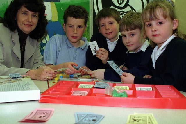 North Seacroft Playstation After School Club at Project Base on Kentmere Avenue in Seacroft in March 1998. Pictured, from left, are Beverley Hare, Scott Howells, Ben Kavanagh, Ian McCarthy and Bethany McCarthy.