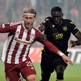 Olympiacos' English forward Josh Bowler (L) fights for the ball with Nantes' French defender Dennis Appiah (R) during the UEFA Europa League Group G football match between Olympiakos (GRE) and Nantes (FRA) at Stadio Georgios Karaiskakis in Piraeus on November 3, 2022. (Photo by ARIS MESSINIS / AFP) (Photo by ARIS MESSINIS/AFP via Getty Images)