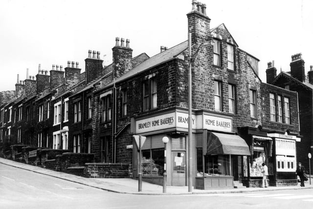 Bramley Home Bakeries Limited at the corner of Hough Lane and Stanningley Road in March 1973. The middle shop is a confectionery and tobacco store and on the far right,  is a shop called Windsor's at the corner with Ashdown Street.