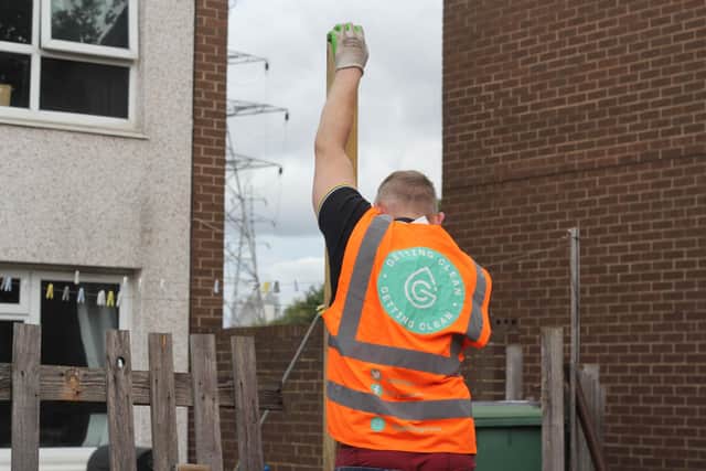 Volunteers from the Getting Clean Project fixed fences, picked litter and trimmed shrubs in Hunslet (Photo: Mars Ricco)