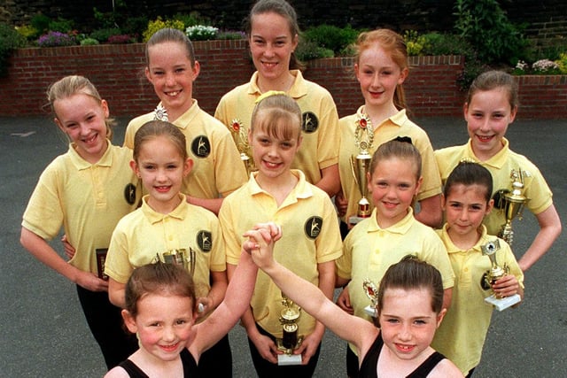 Members of the Walsh School of Theatre Dancing in Drighlington who were celebrating in May 1997 after winning a  number of awards. Pictured, back row from left, are Chloe Thompson, Gemma Hayes, Katie Hayes, Melissa McKenny and Stacey Dawson. Middle row, from left, are Katy Nicholson, Katie Thornton, Holly Beck and Katie Smith.Front row, from left, are, Jessica Broadhead and Lauren Buck.
