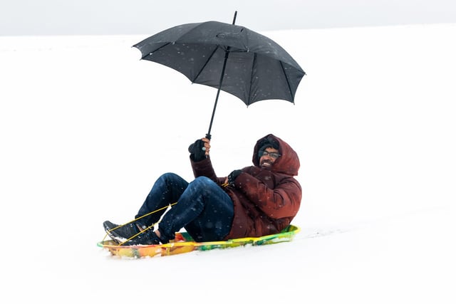 Leeds' largest park has plenty of sledging options, and Hill 60 is one of the city's most popular spots - located in the centre of the park. Pictured is Hamed Alsubhi hitting the slope yesterday.