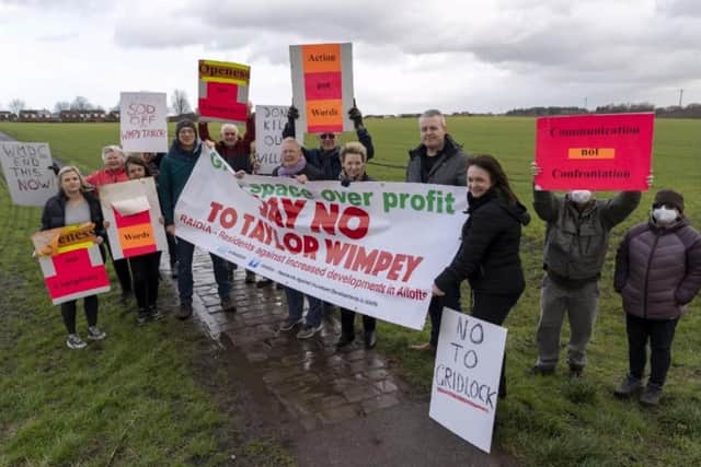More than 2,000 residents have signed a petition opposed to plans to build 400 houses on farmland in Altofts.