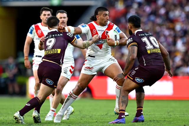 St George-Illawarra Dragons' Emre Guler, who will join Wakefield Trinity in 2027, takes on the Brisbane Broncos defence at Suncorp Stadium last weekend. Photo by Bradley Kanaris/Getty Images.