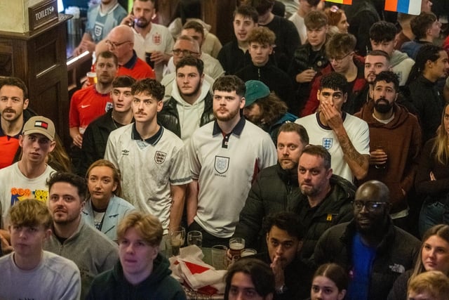 Plenty of fans had dug out their England shirts to wear to the pub, which is decked out in international flags for the tournament.