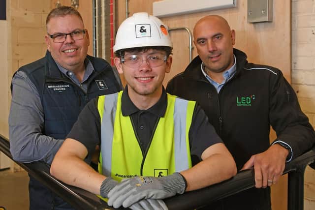 L-R Paul Churchill from G&H with apprentice Callum Barry and Mark Kitchen from LED Electrical, in the new training facility.