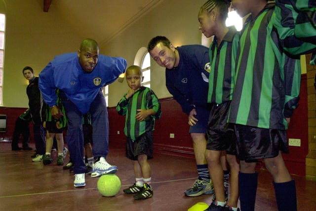 Leeds United defendetr Michael Duberry officially opened the Elford Youth Club, held at St Aidan's Church in  May 2001. He is pictured along side young Kane Adams and Leeds United development community football coach Andrea Loberto with other club members looking on.