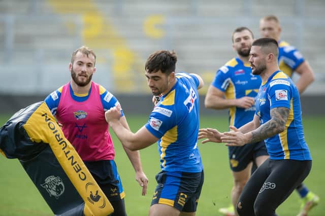 James Bentley, right, with Leeds Rhinos teammates Jarriod O'Connor, left and Jack Sinfield at pre-season training. Picture by Tony Johnson.