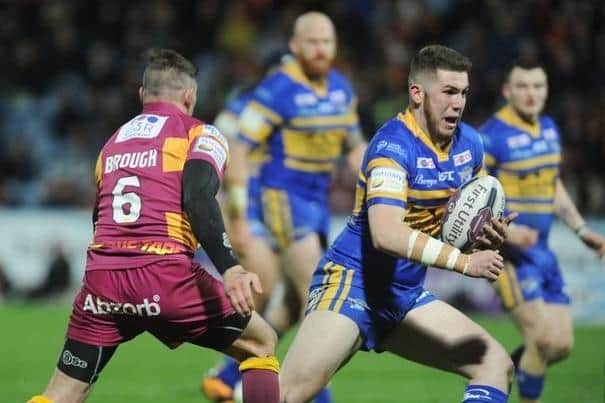 Cameron Smith on the ball for Leeds Rhinos during his debut away to Huddersfield Giants in April, 2016. Picture by Steve Riding.
