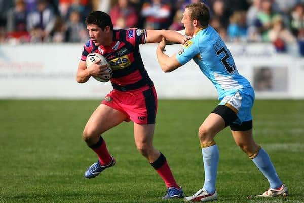 Josh Griffin tackles Leeds Rhinos' Chris Clarkson during his first spell at Wakefield, in 2011. Picture by Vaughn Ridley/SWpix.com.