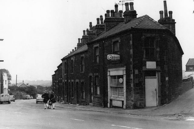 Crofton Terrace in July 1970. Wide Lane is to the left of the terraced houses and Rod Mills Lane to the right. A newsagents is at the junction of the roads advertising 'Sweets and tobacco'.