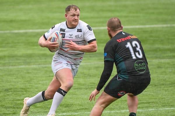 Jordan Johnstone, with ball, in action for Widnes against Wests Warriors in a Challenge Cup tie four months ago. Picture by Olly Hassell/SWpix.com.