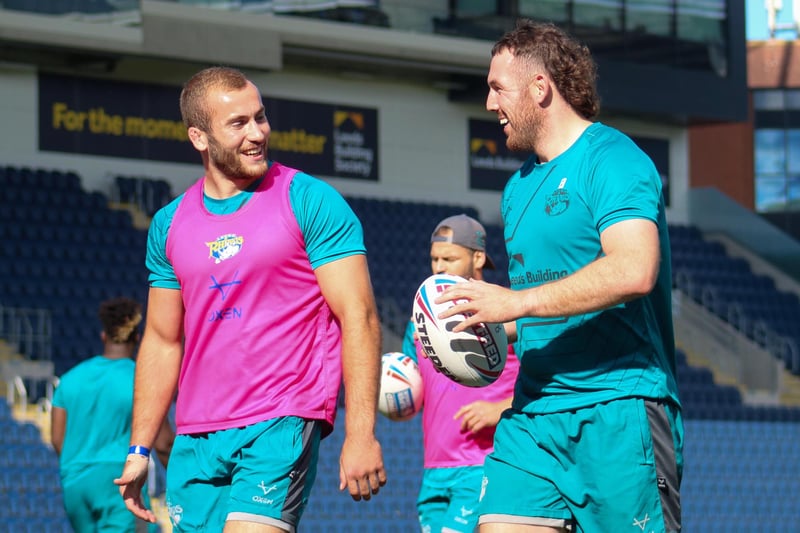 Jarrod O'Connor and Cameron Smith enjoy a lighter moment at training ahead of Sunday's clash with Warrington Wolves.