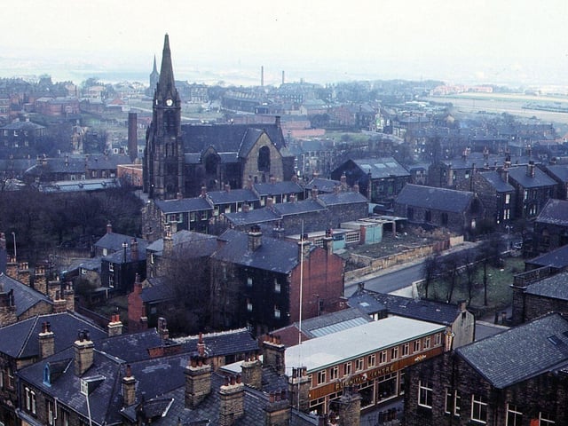 Looking north-east from Morley Town Hall Tower. Dominating the picture is St. Mary's-in-the-Wood Church, with St. Peter's Church in the distance behind this. Commercial Street is on the bottom right, with Zoar Street leading off from this to the centre right. Buildings on Queen Street can be seen in the bottom left hand corner.