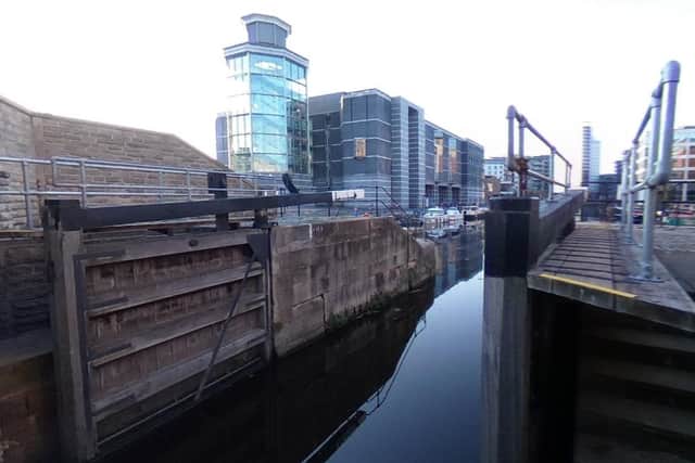The woman was spotted by passers by in Leeds Dock at just after 9pm.