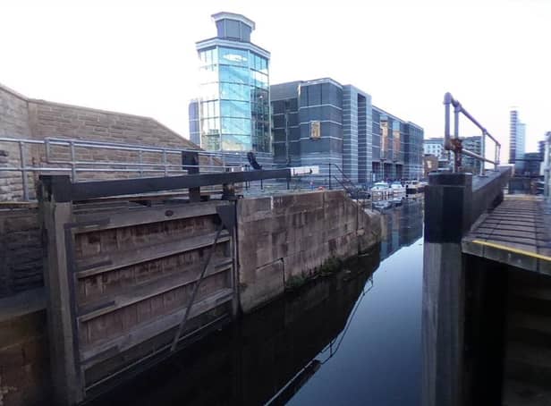 The woman was spotted by passers by in Leeds Dock at just after 9pm.