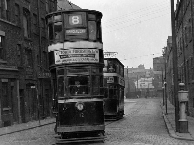 The number 8 special trundles down Sovereign Street in April 1955. Stewarts and Lloyds Ltd tubes, fittings and manufacturers can be seen on the left.