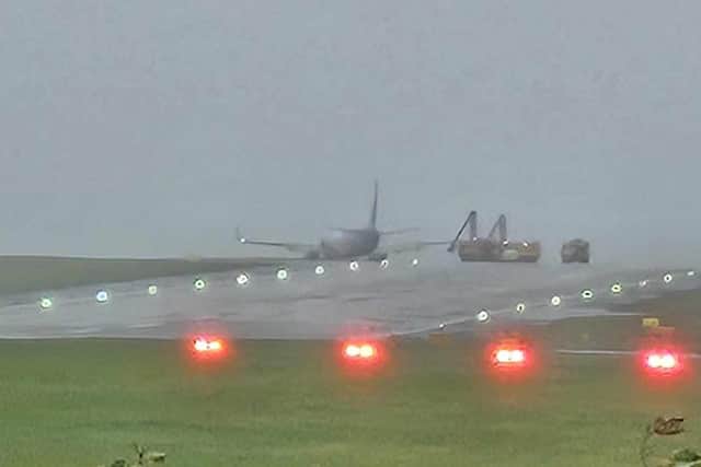 The plane skidded off of the runway while landing on Friday afternoon