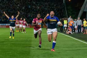 Ryan Hall scores as the hooter sounds to secure victory for Leeds Rhinos at Huddersfield Giants in the final game of the 2015 regular season, winning them the Super League leaders' shield. Picture by Allan McKenzie/SWpix.com.