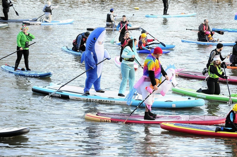 Members of Leeds Dock Paddle Boarding and White Rose Canoe Club were among those braving the waters in colourful and crazy costumes.