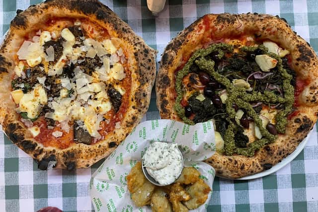 Pizza Pilgrims is now open on Boar Lane. Pictured is the smokey aubergine parm pizza, the pizz' & love and a side of artichokes. Photo: National World