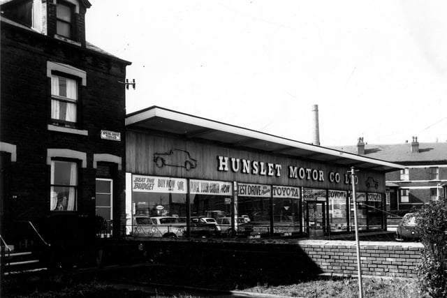 Hunslet Motor Co Ltd car showroom on Low Road in April 1968. On the left is number 128 Spring Grove Terrace, this row of seven houses were numbered for Low Road. The car showroom is a Toyota dealership, one window banner advertises 'Beat the Budget, Buy Now and Save!'