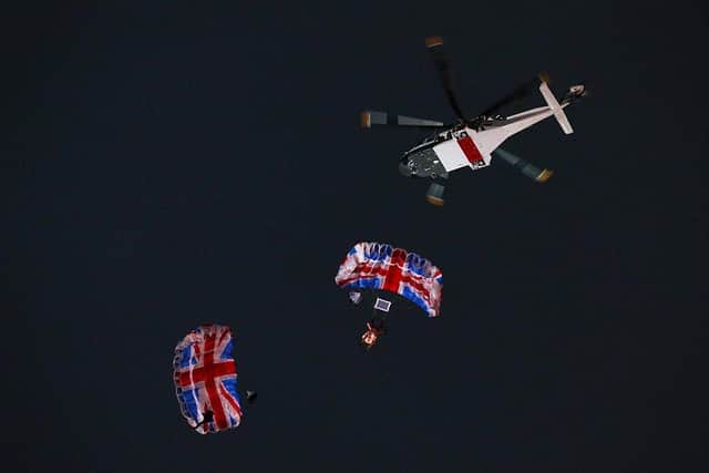 Gary Connery and Mark Sutton parachute into the stadium as part of short James Bond film featuring Daniel Craig and The Queen during the Opening Ceremony of the London 2012 Olympic Games at the Olympic Stadium on July 27, 2012.
