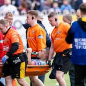Wigan's Willie Isa is stretchered off after being injured in Sunday's Challenge Cup win at Castleford Tigers. Picture by Allan McKenzie/SWpix.com.