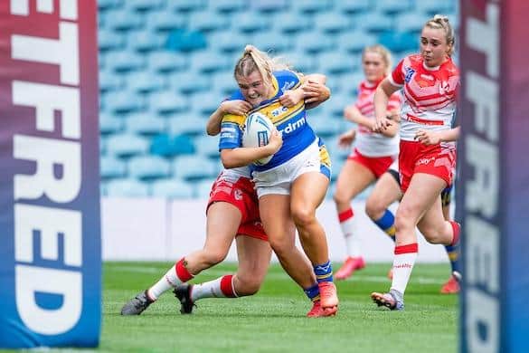 Zoe Hornby scores for Rhinos in last season's Women's Challenge Cup final defeat by St Helens at Elland Road.  Picture by Allan McKenzie/SWpix.com.