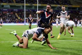 IMPRESSIVE: England's Dom Young scores his sides sixth try during the Rugby League World Cup group A match against France at the University of Bolton Stadium. Picture: Richard Sellers