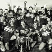 Paul Gill, third from left on the front row, celebrates with terammates after captaining Leeds' second team to a trophy success in the 1980s.