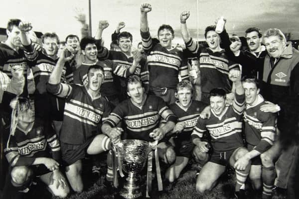 Paul Gill, third from left on the front row, celebrates with terammates after captaining Leeds' second team to a trophy success in the 1980s.