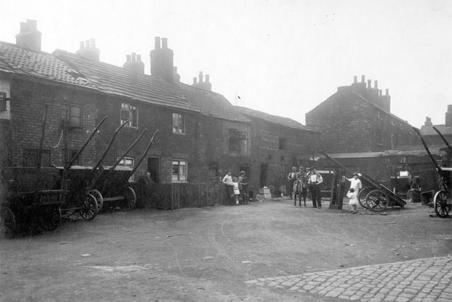 Finny Yard, located on a corner plot of land, fronting on Low Road and Church Street in August 1929.