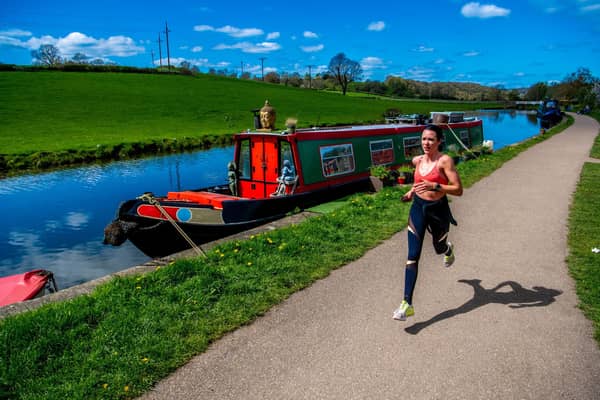 The canal runs from the Aire & Calder Navigation in Leeds to the River Mersey in Liverpool. A wonderful way to work, rest and play. Pictured is Kate Corcoran from Rawdon striding out as she excerises on a beautiful spring day.