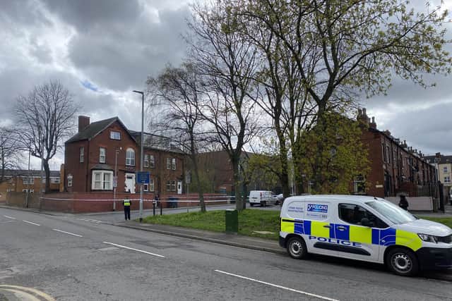 The police cordon on Bellbrooke Avenue, Harehills, after an 18-year-old man was seriously injured in a knife attack