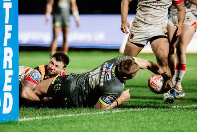 Cooper Jenkins scores for Leeds Rhinos in their 24-12 Good Friday win at Odsal, but coach Brad Arthur admits Bradford Bulls 'came at us hard'. Picture by Alex Whitehead/SWpix.com.